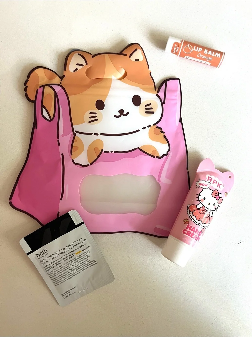 💜 Hello Kitty Themed Gift Bag, Hand Cream, Lip Balm and Vitamin C